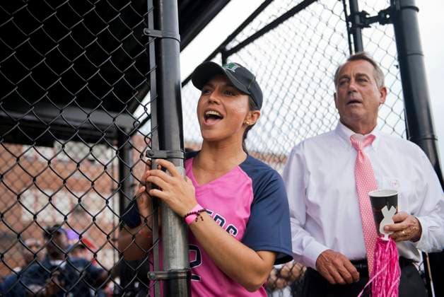 Congressional Women s Softball UNITED STATES - JUNE 26: Rep. Tulsi Gabbard, D-Hawaii, and Speaker John Boehner, R-Ohio, watch the Congressional Women s Softball game that pits Congresswomen against female journalists at Watkins Recreation Center on Capitol Hill. The reporters prevailed in a 11-8 victory. The game benefits the Young Survival Coalition that helps young women with breast cancer. (Photo By Tom Williams CQ Roll Call) Washington DC United States EDITORIAL USE ONLY Copyright: x x2013xCQxRollxCallx TomxWilliamsx rollcallpix077969
