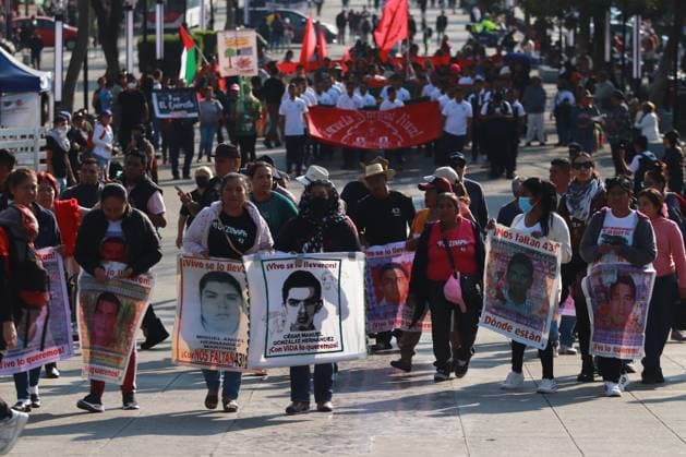 Relatives of the 43 missing students from Ayotzinapa take part during a demonstration from the Glorieta de Peralvillo to the Basilica of Guadalupe. on December 26, 2024 in Mexico City, Mexico. Mexico City Mexico - ZUMAe321 20241226_zia_e321_042 Copyright: xCarlosxSantiagox
