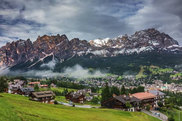 Cortina d Ampezzo town panoramic view with alpine green landscape and massive Dolomites Alps in the background. Province of Belluno, South Tyrol, Italy. , 31870210.jpg, tyrol, south tyrol, italy, town, cortina, nature, tourism, sky, landscape, alps, travel, view, europe, alpine, green, peak, ampezzo, scenic, mountain, dolomiti, landmark, famous, dolomite, architecture, idyllic, urban, village, square, italia, destination, church, cortina d ampezzo, cortina d ampezzo, veneto, valley, panorama, trentino alto adige, summit, scenery, peaks, sudtirol, unesco, massive, cortina d ampezzoo, cortinadampezzo, tourism south tyrol, sunny sky, lavaredo, townscape, sunlight RECORD DATE NOT STATED