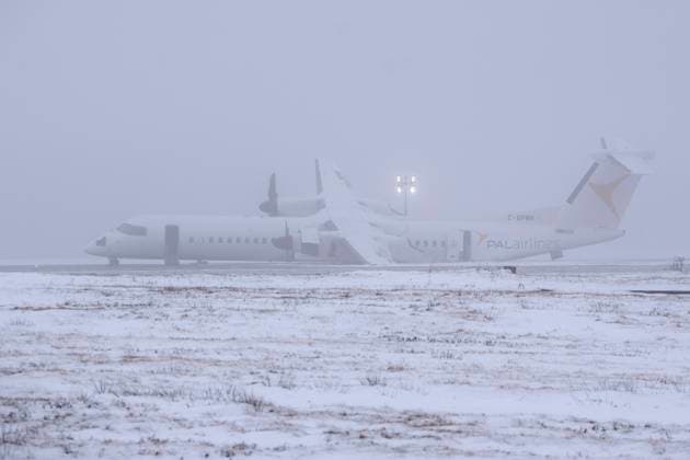 December 29, 2024, Halifax, Ns, Canada: An aircraft that skidded off the runway after catching fire at Halifax Stanfield International Airport is seen on Sunday, December 29, 2024. An Air Canada Express flight operated by PAL Airlines carrying 73 passengers arriving from St. John s, N.L., experienced a suspected landing gear issue after arrival Saturday night with passengers being off-loaded with no reported injuries. Halifax Canada  - ZUMAc35_ 20241229_zaf_c35_001 Copyright: xDarrenxCalabresex