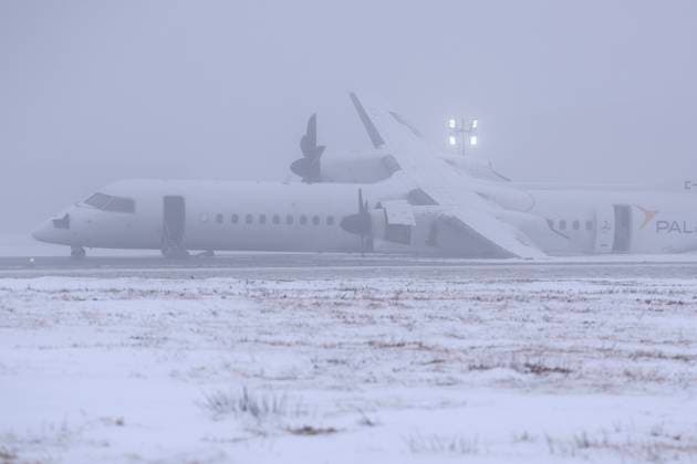 December 29, 2024, Halifax, Ns, Canada: An aircraft that skidded off the runway after catching fire at Halifax Stanfield International Airport is seen on Sunday, December 29, 2024. An Air Canada Express flight operated by PAL Airlines carrying 73 passengers arriving from St. John s, N.L., experienced a suspected landing gear issue after arrival Saturday night with passengers being off-loaded with no reported injuries. Halifax Canada  - ZUMAc35_ 20241229_zaf_c35_007 Copyright: xDarrenxCalabresex