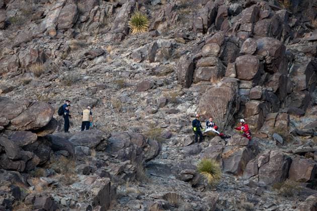 Migration Mexico A rescue team climbs a hill to recover the body of the immigration officer who loses his life during an attack with rocks thrown by migrants while he attempts to question them about their migration status Juarez Mexico  Copyright: xDavidxPeinadox originalFilename: peinado-migrants241230_npa52.jpg