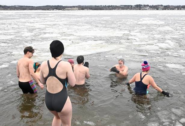 January 1, 2025, Quebec, Pq, Canada: Organiser Francis Vachon, right, is joined by cold water swimmers into the icy water of the St.Lawrence river for a Polar Bear swim on New Year s Day in Quebec City, Wednesday, Jan. 1, 2025. Quebec Canada  - ZUMAc35_ 20250101_zaf_c35_010 Copyright: xJacquesxBoissinotx