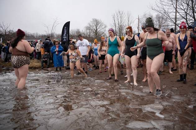January 1, 2025, Dartmouth, Ns, Canada: People prepare to enter the ice-filled water in Lake Banook during the annual polar bear swim on New Year s Day in Dartmouth, N.S., Wednesday, Jan. 1, 2025. Dartmouth Canada  - ZUMAc35_ 20250101_zaf_c35_032 Copyright: xDarrenxCalabresex