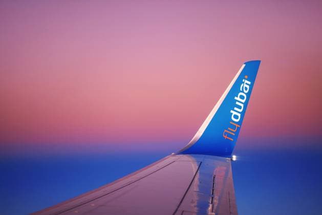 RECORD DATE NOT STATED Wing of the FlyDubai airplane during a flight. Winglet of an airliner against the background of the dawn sky. 27.01.2022 Dubai. , 44619690.jpg, flight, flydubai, dubai, winglet, fly, heaven, wing, aircraft, airline, blue, airplane, sky, travel, airliner, jet, low-cost, airways, air, passenger, airport, aeroplane, plane, skyline, transport, trip, high, aviation, business, during, journey, ocean, space, view, flying, vacation, tourism, atmosphere, transportation, modern, wingtip, freedom, horizontal, majestic, sunlight, departure, vehicle, tranquility, midair, runway, tranquil scene