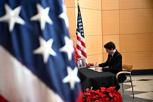 January 3, 2025, Ottawa, On, CAN: Prime Minister Justin Trudeau signs a book of condolences for former U.S. President Jimmy Carter at the U.S. Embassy in Ottawa, on Friday, Jan. 3, 2025. Ottawa CAN  - ZUMAc35_ 20250103_zaf_c35_023 Copyright: xJustinxTangx
