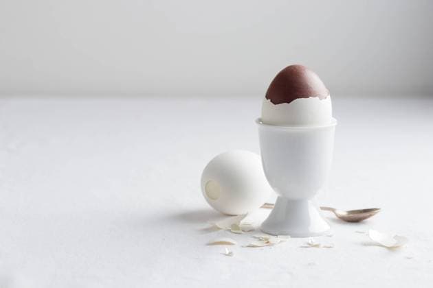 Chocolate egg on white eggstand holder with copy space , 47457390.jpg, chocolate, round, egg, sweet, milky, shell, egg holder, milk, finland cuisine, confectionery, finnish, mignon, mild, tasty, tradition, food, floral, white, easter, holiday, background, brown, candy, level, choco, cocoa, yummy, delicate, delicious, surprise, desserts, gourmet, dessert, holder, spoon RECORD DATE NOT STATED