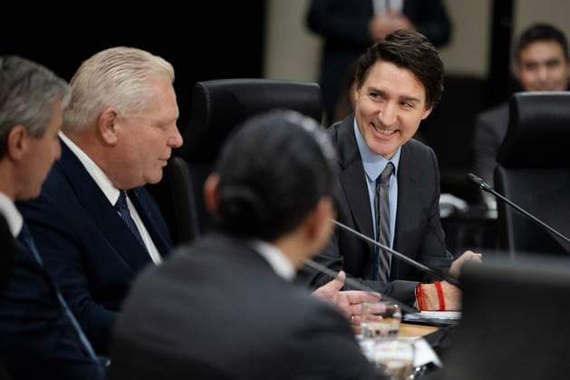 January 15, 2025, Ottawa, On, Canada: Prime Minister Justin Trudeau, centre, listens to Ontario Premier Doug Ford s remarks during a first ministers meeting in Ottawa on Wednesday, Jan. 15, 2025. Ottawa Canada  - ZUMAc35_ 20250115_zaf_c35_060 Copyright: xJustinxTangx