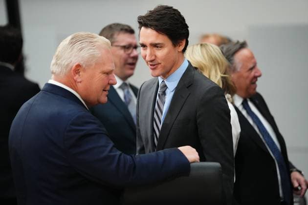 January 15, 2025, Ottawa, On, Canada: Prime Minister Justin Trudeau talks with Ontario Premier Doug Ford at the start of at a first ministers meeting in Ottawa on Wednesday, Jan.15, 2025. Ottawa Canada  - ZUMAc35_ 20250115_zaf_c35_072 Copyright: xSeanxKilpatrickx