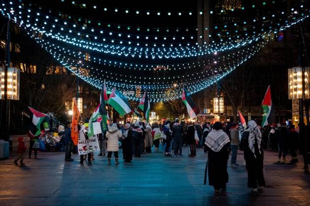 January 15, 2025, Vancouver, Bc, CANADA: People gather to celebrate the Gaza ceasefire and hostage deal reached between Israel and Hamas in Vancouver, on Wednesday, January 15, 2025. Vancouver CANADA  - ZUMAc35_ 20250115_zaf_c35_228 Copyright: xEthanxCairnsx