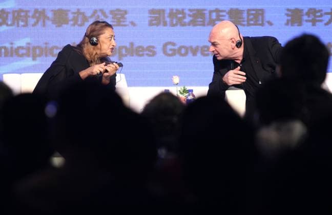 (from left to right) World famous architects Zaha Hadid and Jean Nouvel, both Pritzker Architecture Prize Laureates, talk at Beijing Architecture Forum which opens in Beijing, China, on May 24, 2012. The Forum aims to provide a unique opportunity to gather many of the world s most recognized international and Chinese architects, academics and future leaders in the field of collaborate on and debate a wide range of architectural topics of relevance today with a focus on urban harmony. 24MAY12 Photo by Simon Song Beijing China EDITORIAL USE ONLY  Copyright: xx MER1205242314435196 SimonxSongx scmpphotos653105