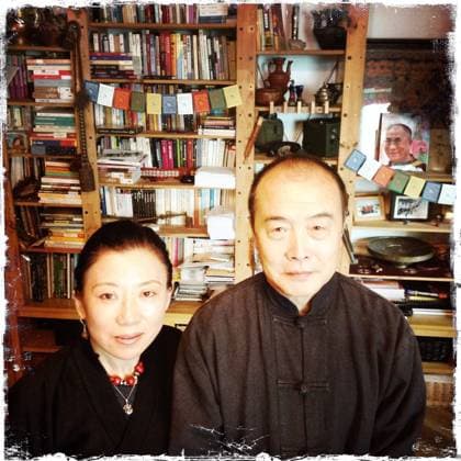 Wang Lixiong (RIGHT) and his Tibetan wife Tsering Woeser pose for a photograph at their home in Beijing. 17DEC13 == Photo by Simon Song == 19JANUARY2014 POST MAGAZINE Beijing - China EDITORIAL USE ONLY  Copyright: xx MER1401101715202439 SimonxSongx scmpphotos734315