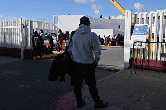 January 17, 2025, Tijuana, Baja California, Mexico: An asylum seeker with a cancelled CBP One appointment to enter the United States waits to speak to a Mexican immigration official to check his documents at the El Chaparral border crossing port in Tijuana, Mexico on Friday, January 17, 2025. Incoming President Donald Trump has promised to shut down the CBP One asylum app for migrants crossing legally on day one of his administration.The CBP One mobile app allows asylum seekers to schedule appointments through U.S. Customs and Border Protection (CBP) to enter the United States. At least for now. In June, outgoing President Joe Biden issued an executive action that makes most migrants who cross the border illegally ineligible for asylum. A m - ZUMAm180 20250117_zip_m180_006 Copyright: xCarlosxA.xMorenox