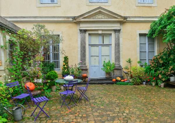 Front door decorated with autumn flowers, pumpkins and plants. , 47942208.jpg, architecture, autumn, boundary, brick, can, chair, coblestone, corn, day, decor, decoration, door, driveway, entrance, exterior, facade, fall, flowers, france, front, frontdoor, garden, gardener, grass, green, halloween, home, house, hydrangea, lawn, nature, october, orange, ornament, ornate, outdoor, pathway, plant, pumpkin, season, shrubs, steps, stone, table, Thanksgiving, trickortreat, watering, wreath, yard, zucchini RECORD DATE NOT STATED