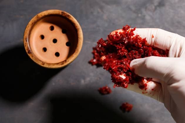 Tobacco for hookah in a clay bowl , 47998120.jpg, background, hand, party, water, fruit, leaf, art, hookah, shisha, smoke, pipe, tobacco, bar, bowl, east, red, aroma, clay, arabic, coal, relaxation, turkish, traditional, charcoal, orange, nobody, metal, lounge, culture, leisure, flavor, cup, style, asia, mouthpiece, restaurant, coals, blow, lemon, nicotine, prepare, base, bulb, table, vase, hooka, addiction, fragrant, spark, asian RECORD DATE NOT STATED