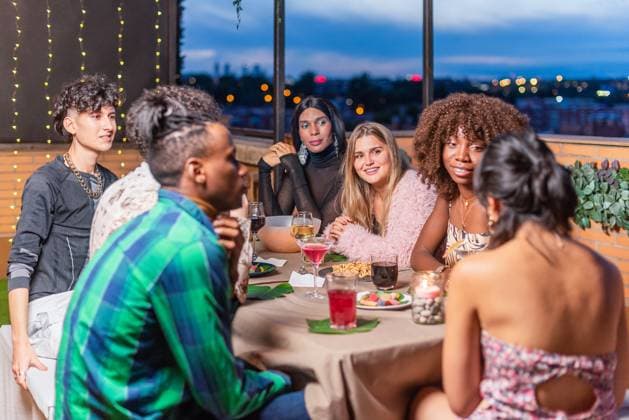 A group of friends celebrating New Year s Eve on the balcony of the house of one of them., model released, , 48355006.jpg, caucasian, blonde, woman, asian, lifestyle, friends, sitting, togetherness, fun, drinking, cheerful, celebration, adult, talking, cocktail, group, happy, fashion, african american, horizontal, multi ethnic, happiness, friendship, enjoyment, multiracial group, terrace, balcony, 20s, multi-ethnic, people, young, smiling, diversity, party, eve, christmas, holiday, year, night, light, new year, home, xmas, indoors, joy, event, luxury, festive, evening, drink RECORD DATE NOT STATED