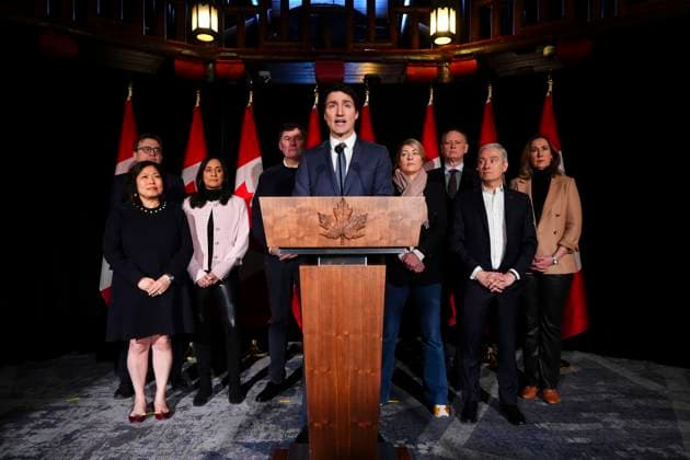 January 21, 2025, Montebello, Quebec, CAN: Prime Minister Justin Trudeau stands with members of his cabinet and Canada s Ambassador to the US Kirsten Hillman as he holds a press conference during a cabinet retreat at Chateau Montebello in Montebello, Que., on Tuesday, Jan. 21, 2025. Montebello CAN  - ZUMAc35_ 20250121_zaf_c35_015 Copyright: xSeanxKilpatrickx