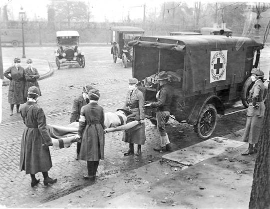 February 27, 1919, St. Louis, Missouri, USA: Members of the American Red Cross remove Spanish influenza victims from a house at Etzel and Page avenues in 1919. The flu pandemic, also known as the Great Influenza epidemic or by the common name the Spanish flu, was an exceptionally deadly global influenza pandemic caused by the H1N1 subtype of the influenza A virus. The earliest documented case was March 1918 in the state of Kansas in the United States, with further cases recorded in France, Germany and the United Kingdom in April. Nearly a third of the global population, or an estimated 500 million people, have been infected in four successive waves. Estimates of deaths range from 17 million to 50 million, and possibly as high as 100 million - ZUMAm67_ 19190227_pj1_s68_001 Copyright: xSt.xLouisxPost-Dispatchx