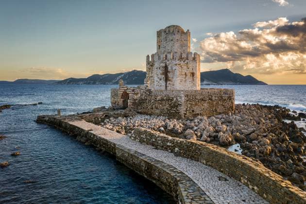 Bourtzi Methoni castle drone aerial view at sunset in Greece Methoni, Greece CR_UGOUSD250120-1613547-01