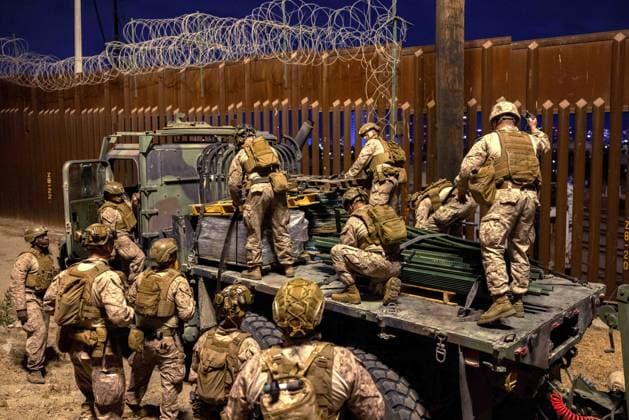 January 25, 2025, San Ysidro, Ca, United States: U.S. Marines with the 1st Combat Engineer Battalion, 1st Marine Division, deploy concertina wire as they re-enforce the border wall, January 25, 2025 near San Ysidro, California. U.S President Donald Trump requested the armed forces to support Homeland security in securing the southern border. San Ysidro United States - ZUMAp138 20250125_zaa_p138_010 Copyright: xSgt.xKylexChan U.SxAirx