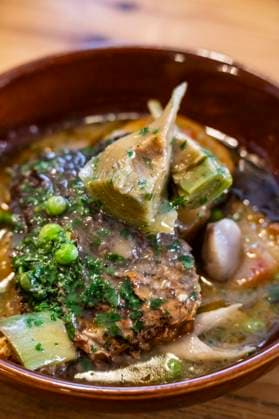 Corvina in grüner Soße mit Artischocken und tinars Kartoffeln Corvina in green sauce with artichokes and tinars potatoes, Vida Meva author restaurant, Mallorca, Balearic Islands, Spain Copyright: xZoonar.com Tolox 22730966
