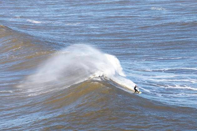 Storm Ivo Continues To Generate Massive Swells In NazarÃ A surfer rides a wave on Praia Norte in Nazare, Portugal, on January 31, 2025. Strong swells and high winds from Storm Ivo persist in Nazare, creating extreme conditions for surfers and spectators. Authorities urge caution as forecasts predict ongoing powerful waves along the iconic coastline. Nazare Portugal  Copyright: xLuisxBozax originalFilename: boza-stormivo250131_npMuQ.jpg