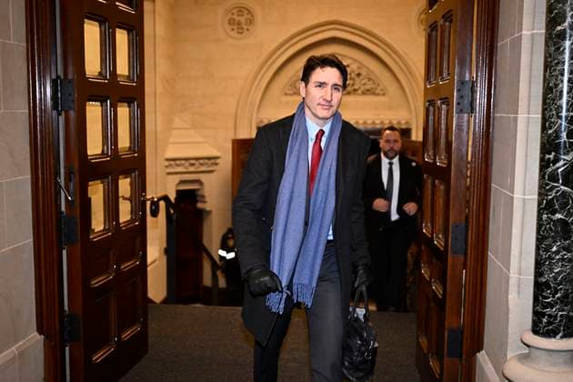 February 1, 2025, Ottawa, On, CANADA: Prime Minister Justin Trudeau arrives to address media following the imposition of a raft of tariffs by U.S. President Donald Trump against Canada, Mexico and China, in Ottawa, Saturday, Feb. 1, 2025. Tariffs of 10 per cent on Canadian energy and 25 per cent on everything else will begin on Feb. 4. Ottawa CANADA  - ZUMAc35_ 20250201_zaf_c35_122 Copyright: xJustinxTangx
