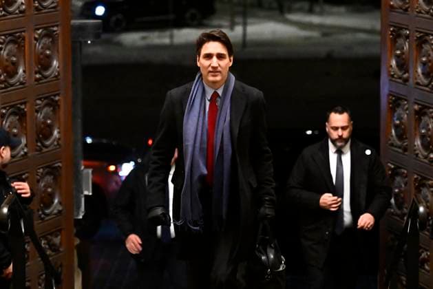 February 1, 2025, Ottawa, On, CANADA: Prime Minister Justin Trudeau arrives to address media following the imposition of a raft of tariffs by U.S. President Donald Trump against Canada, Mexico and China, in Ottawa, Saturday, Feb. 1, 2025. Tariffs of 10 per cent on Canadian energy and 25 per cent on everything else will begin on Feb. 4. Ottawa CANADA  - ZUMAc35_ 20250201_zaf_c35_123 Copyright: xJustinxTangx