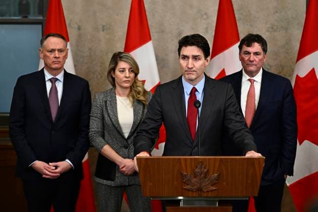 February 1, 2025, Ottawa, On, CANADA: Prime Minister Justin Trudeau addresses media following the imposition of a raft of tariffs by U.S. President Donald Trump against Canada, Mexico and China, in Ottawa, Saturday, Feb. 1, 2025. Minister of Public Safety David McGuinty, left to right, Global Affairs Minister Melanie Joly and Minister of Governmental Affairs Dominic LeBlanc look on. Ottawa CANADA - ZUMAc35_ 20250201_zaf_c35_125 Copyright: xJustinxTangx
