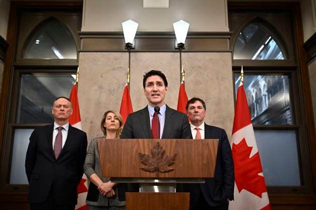 February 1, 2025, Ottawa, On, CANADA: Prime Minister Justin Trudeau addresses media following the imposition of a raft of tariffs by U.S. President Donald Trump against Canada, Mexico and China, in Ottawa, Saturday, Feb. 1, 2025. Minister of Public Safety David McGuinty, left to right, Global Affairs Minister Melanie Joly and Minister of Governmental Affairs Dominic LeBlanc look on. Ottawa CANADA - ZUMAc35_ 20250201_zaf_c35_127 Copyright: xJustinxTangx