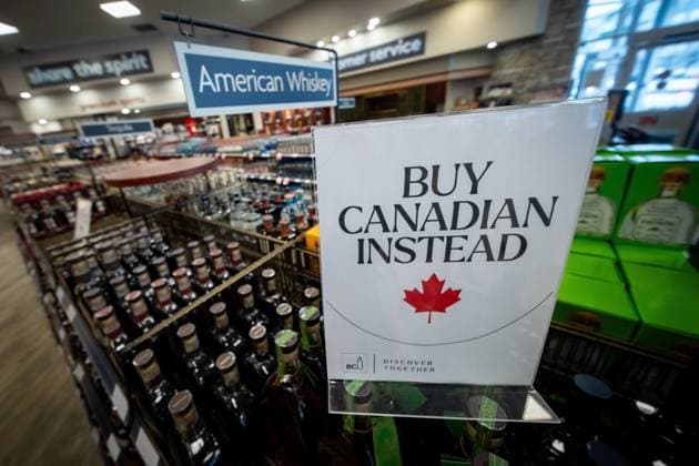 February 2, 2025, Vancouver, Bc, CANADA: A sign is placed in front of the American whiskey section at a B.C. liquor store after top selling American made products have been removed from shelves in Vancouver, B.C., Sunday, Feb. 2, 2025. Vancouver CANADA  - ZUMAc35_ 20250202_zaf_c35_112 Copyright: xEthanxCairnsx