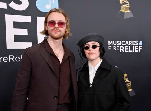 (L-R) FINNEAS and Billie Eilish arrive for the 67th Annual Grammy Awards at Crypto.com Arena in Los Angeles on February 2, 2025. The awards ceremony will honor the best recordings, compositions, and artists from September 16, 2023, to August 30. 2024, as chosen by the members of the Recording Academy.  LAP20250202284 JIMxRUYMEN