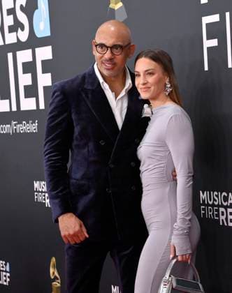 Harvey Mason Jr., CEO, MusicCares & Recording Academy, and Britt Mason arrive for the 67th Annual Grammy Awards at Crypto.com Arena in Los Angeles on February 2, 2025. The awards ceremony will honor the best recordings, compositions, and artists from September 16, 2023, to August 30. 2024, as chosen by the members of the Recording Academy.  LAP20250202415 JIMxRUYMEN