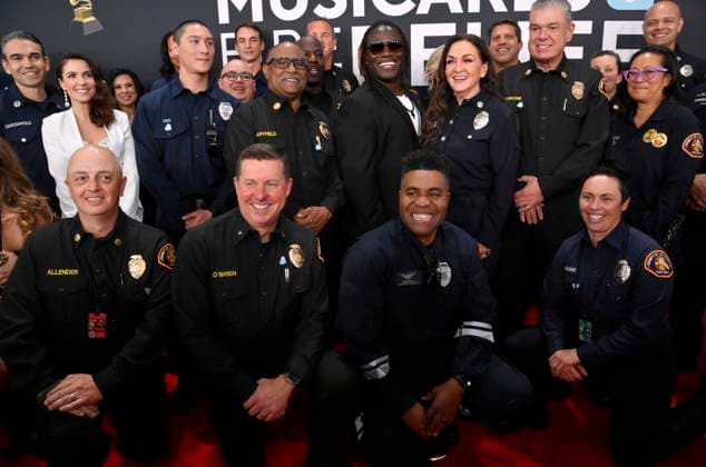 Los Angeles County firefighters arrive for the 67th Annual Grammy Awards at Crypto.com Arena in Los Angeles on February 2, 2025. The awards ceremony will honor the best recordings, compositions, and artists from September 16, 2023, to August 30. 2024, as chosen by the members of the Recording Academy.  LAP20250202493 JIMxRUYMEN