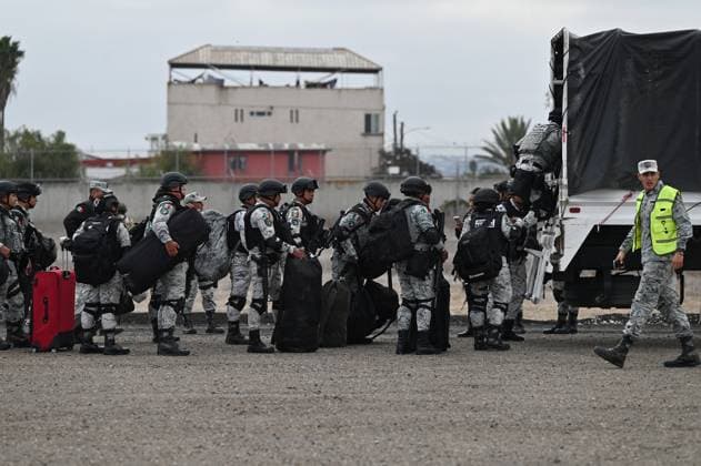 February 4, 2025, Tijuana, Baja California, Mexico: Members of the Mexican National Guard arrive at Military Air Base No. 12 near the Tijuana International Airport in Tijuana, Baja California, Mexico, on Tuesday, February 04, 2025. The arrival of Mexicoâ€⠢s first 300 officers in the border city begins the 10,000 troop deployment President Claudia Sheinbaum had promised US President Donald Trump in exchange for delaying a 25-percent tariff on exported goods for a month with future negotiations to be determined. Tijuana Mexico - ZUMAm180 20250204_zip_m180_025 Copyright: xCarlosxA.xMorenox