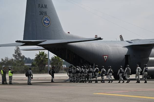 February 4, 2025, Tijuana, Baja California, Mexico: A Mexico s Air Force plane carrying members of the Mexican National Guard arrive at Military Air Base No. 12 near the Tijuana International Airport in Tijuana, Baja California, Mexico, on Tuesday, February 04, 2025. The arrival of Mexicoâ€⠢s first 300 officers in the border city begins the 10,000 troop deployment President Claudia Sheinbaum had promised US President Donald Trump in exchange for delaying a 25-percent tariff on exported goods for a month with future negotiations to be determined. Tijuana Mexico - ZUMAm180 20250204_zip_m180_016 Copyright: xCarlosxA.xMorenox