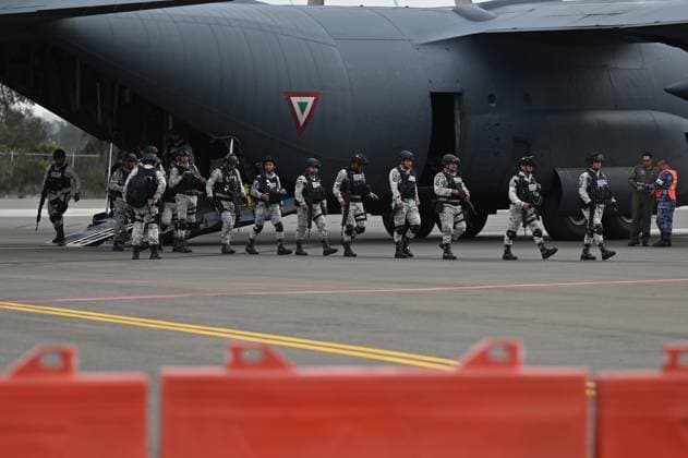 February 4, 2025, Tijuana, Baja California, Mexico: A Mexico s Air Force plane carrying members of the Mexican National Guard arrive at Military Air Base No. 12 near the Tijuana International Airport in Tijuana, Baja California, Mexico, on Tuesday, February 04, 2025. The arrival of Mexicoâ€⠢s first 300 officers in the border city begins the 10,000 troop deployment President Claudia Sheinbaum had promised US President Donald Trump in exchange for delaying a 25-percent tariff on exported goods for a month with future negotiations to be determined. Tijuana Mexico - ZUMAm180 20250204_zip_m180_012 Copyright: xCarlosxA.xMorenox