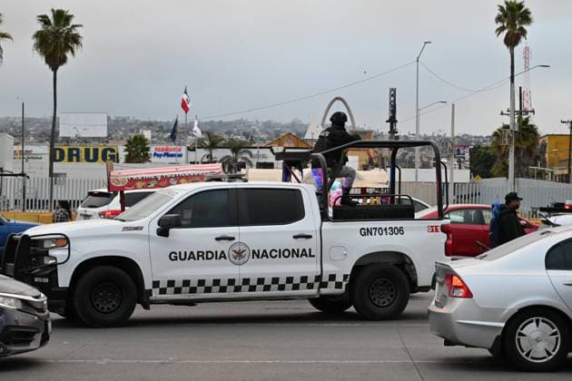 February 6, 2025, Tijuana, Baja California, Mexico: Mexican National Guard officers check vehicles heading to the United States into San Diego, California at the San Ysidro Port of Entry crossing in Tijuana, Baja California, Mexico, on Thursday, February 6, 2025. At the southern border between the US and Mexico a planned distribution of 10,000 Mexican National Guard troops on the US border, under an agreement with US President Donald Trump to stop the flow of migration and drugs like fentanyl. Tijuana Mexico - ZUMAm180 20250206_zip_m180_030 Copyright: xCarlosxA.xMorenox