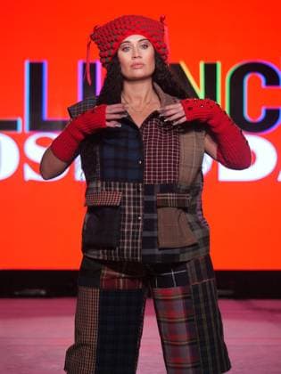 February 9, 2025, New York, New York, USA: High end innovative fantasy, contemporary design and eclectic looks combine at the .Cosmoda Alliance NYFW show. Around the corner from the NYSE on Wall Street models.strutted their styles on the runway with music and passion. New York USA - ZUMAh156 20250209_znp_h156_008 Copyright: xMiloxHessx