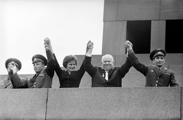 Moscow, USSR. Soviet cosmonauts Andriyan Nikolayev, first man in space Yuri Gagarin, first female cosmonaut Valentina Tereshkova, First Secretary of the Central Committee of the Communist Party of the Soviet Union, Chairman of the USSR Council of Ministers Nikita Khrushchev, and Soviet cosmonaut Valery Bykovsky (L-R) wave standing on the podium of Vladimir Lenin s Mausoleum on Red Square during a rally dedicated to a successful multi-day group space flight of V. Bykovsky and V. Tereshkova aboard Vostok 5 and Vostok 6 spacecrafts. Vasily Yegorov TASS  1542473