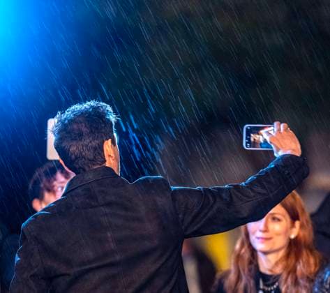 February 13, 2025, Santa Barbara, California, USA: Adrien Brody shoots his selfie in the rain with his phone of him in front of the historic Arlington marquee(see cell phone screen) as he arrives at the red carpet Thursday night to receive the Cinema Vanguard Award at the 40th annual Santa Barbara International Film Festival. Spotlighting their performances in Brady CorbetÃ¢â‚¬â ¢s THE BRUTALIST, BrodyÃ¢â‚¬â ¢s portrayal of Toth highlights an immigrantÃ¢â‚¬â ¢s struggle to overcome his war-torn past and rebuild his life in a Post-War America. Santa Barbara USA - ZUMAa35_ 20250213_zaf_a35_003 Copyright: xDanielxA.xAndersonx