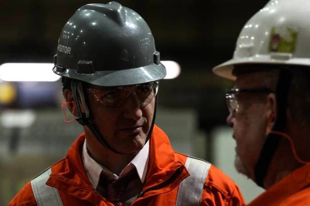 February 14, 2025, Hamilton, On, CAN: Prime Minister Justin Trudeau speaks to a steelworker as he tours then ArcelorMittal Dofasco Steel Plant in Hamilton, on Friday, February 14, 2025. Hamilton CAN  - ZUMAc35_ 20250214_zaf_c35_042 Copyright: xChrisxYoungx