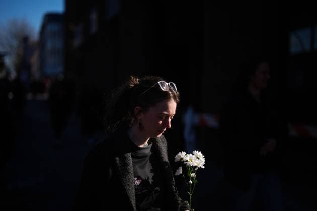 February 14, 2025, Vancouver, Bc, CANADA: A woman carries flowers while participating in the annual Women s Memorial March, in Vancouver, on Friday, February 14, 2025. The march is held to honour missing and murdered Indigenous women and girls from the community with stops along the way to commemorate where women were last seen or found. Vancouver CANADA  - ZUMAc35_ 20250214_zaf_c35_102 Copyright: xDarrylxDyckx