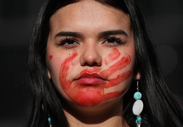 February 14, 2025, Vancouver, Bc, CANADA: A young woman sports a red hand print on her face while participating in the annual Women s Memorial March, in Vancouver, on Friday, February 14, 2025. The march is held to honour missing and murdered Indigenous women and girls from the community with stops along the way to commemorate where women were last seen or found. Vancouver CANADA  - ZUMAc35_ 20250214_zaf_c35_105 Copyright: xDarrylxDyckx