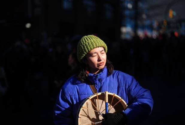 February 14, 2025, Vancouver, Bc, CANADA: A woman carries a drum while participating in the annual Women s Memorial March, in Vancouver, on Friday, February 14, 2025. The march is held to honour missing and murdered Indigenous women and girls from the community with stops along the way to commemorate where women were last seen or found. Vancouver CANADA  - ZUMAc35_ 20250214_zaf_c35_120 Copyright: xDarrylxDyckx