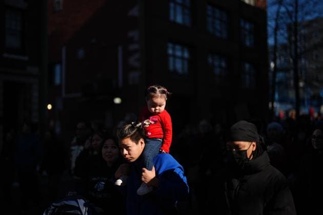 February 14, 2025, Vancouver, Bc, CANADA: A man carries a young girl on his shoulders while participating in the annual Women s Memorial March, in Vancouver, on Friday, February 14, 2025. The march is held to honour missing and murdered Indigenous women and girls from the community with stops along the way to commemorate where women were last seen or found. Vancouver CANADA  - ZUMAc35_ 20250214_zaf_c35_118 Copyright: xDarrylxDyckx