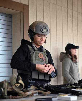 December 15, 2022, Fort Libert, Nc, United States: Former Congresswoman Tulsi Gabbard, loads a magazine with ammo during the 2022 Green Beret Celebrity Tactical Challenge at the U.S. Army John F. Kennedy Special Warfare Center and Miller Training Complex, December 15, 2022 in Fort Liberty, North Carolina. Fort Libert United States - ZUMAp138 20221215_zaa_p138_069 Copyright: xK.xKassens U.SxArmyx