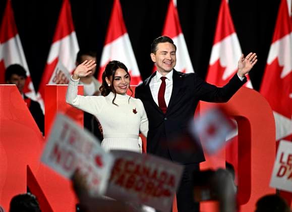 February 15, 2025, Ottawa, On, CAN: Conservative Leader Pierre Poilievre and his wife Anaida wave as they walk on stage before his speech at his Canada First rally in Ottawa, on Saturday, Feb. 15, 2025. Ottawa CAN  - ZUMAc35_ 20250215_zaf_c35_146 Copyright: xJustinxTangx