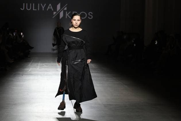 KYIV, UKRAINE - FEBRUARY 15, 2025 - A model with a prosthetic lower limb walks the catwalk during the fashion show by the Juliya Kros brand as part of Ukrainian Fashion Week FW25-26 at the Mystetskyi Arsenal National Cultural, Art and Museum Complex, Kyiv, capital of Ukraine Juliya Kros fashion show at UFW in Kyiv  Copyright: xPavloxBahmutx