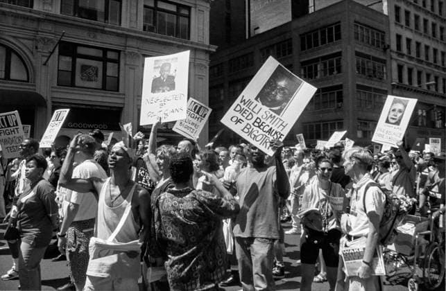 marchers hold up pictures of AIDS victims during NYC Pride March in New York City, USA on June 28th 1992 *** marchers hold up pictures of AIDS victims during NYC Pride March in New York City, USA on June 28th 1992